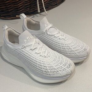 APL Women’s zipline Knit Slip-On Sneaker in White